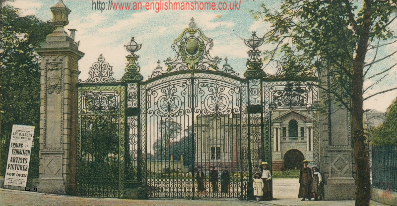 Lister park gates with people posing.