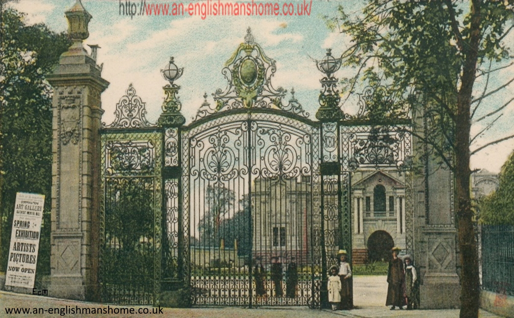 Lister park gates with people posing.